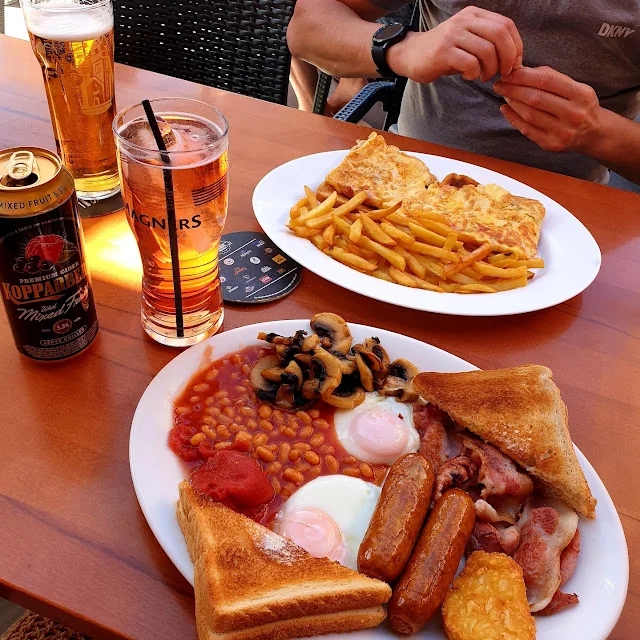 Full English breakfast plated and ready to serve at Rovers Return